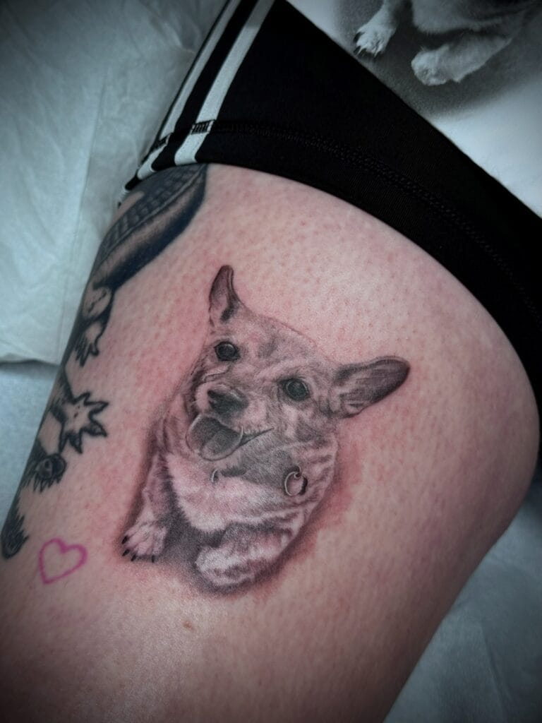 black and grey hyper realistic dog portrait tattoo